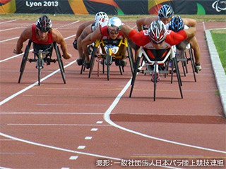 A sport-specific 3 wheel wheelchair called a racer is light-weighted using carbon and titanium